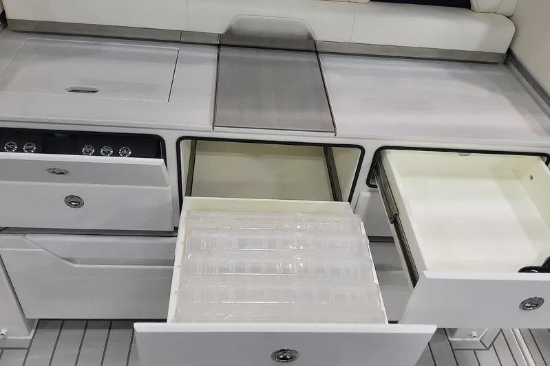  Yacht Photos Pics 2024 Formula 387 Center Console Fish boat interior with open storage compartments.