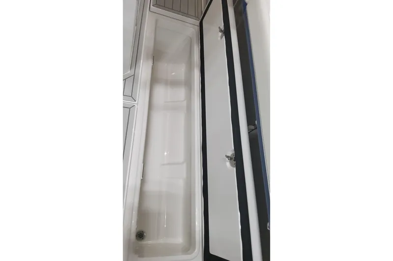  Yacht Photos Pics 2024 Formula 387 Center Console Fish storage compartment, open view.