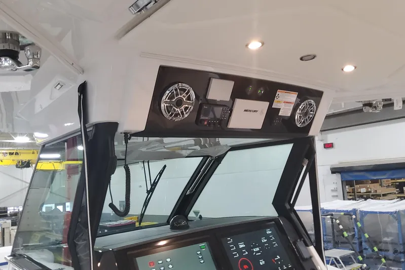  Yacht Photos Pics 2024 Formula 387 Center Console Fish boat dashboard with advanced controls and speakers.