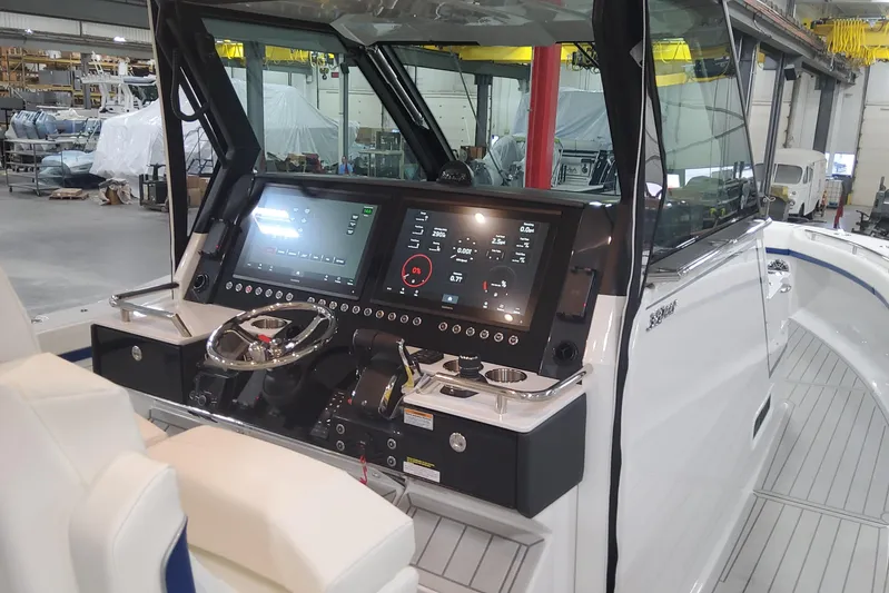  Yacht Photos Pics 2024 Formula 387 Center Console Fish boat interior with advanced navigation system.