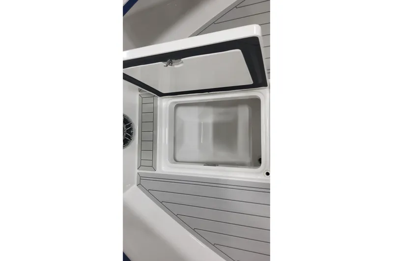  Yacht Photos Pics 2024 Formula 387 Center Console Fish boat storage compartment open, showcasing interior design.
