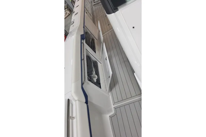  Yacht Photos Pics 2024 Formula 387 Center Console Fish boat interior with open storage compartments.