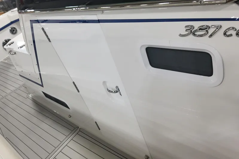  Yacht Photos Pics 2024 Formula 387 Center Console Fish boat, sleek white exterior with modern design elements.