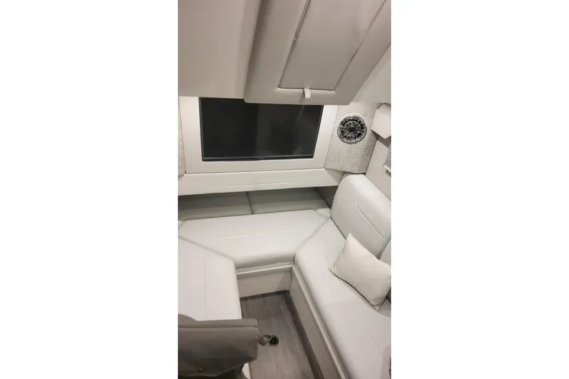  Yacht Photos Pics 2024 Formula 387 Center Console Fish cabin interior with modern seating and entertainment system.