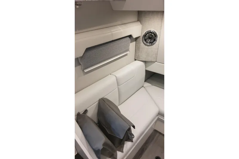  Yacht Photos Pics 2024 Formula 387 Center Console Fish interior with white seating and decorative pillows.