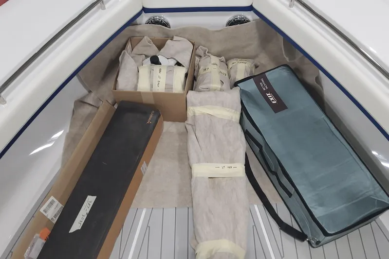  Yacht Photos Pics 2024 Formula 387 Center Console Fish boat storage area with packaged equipment.