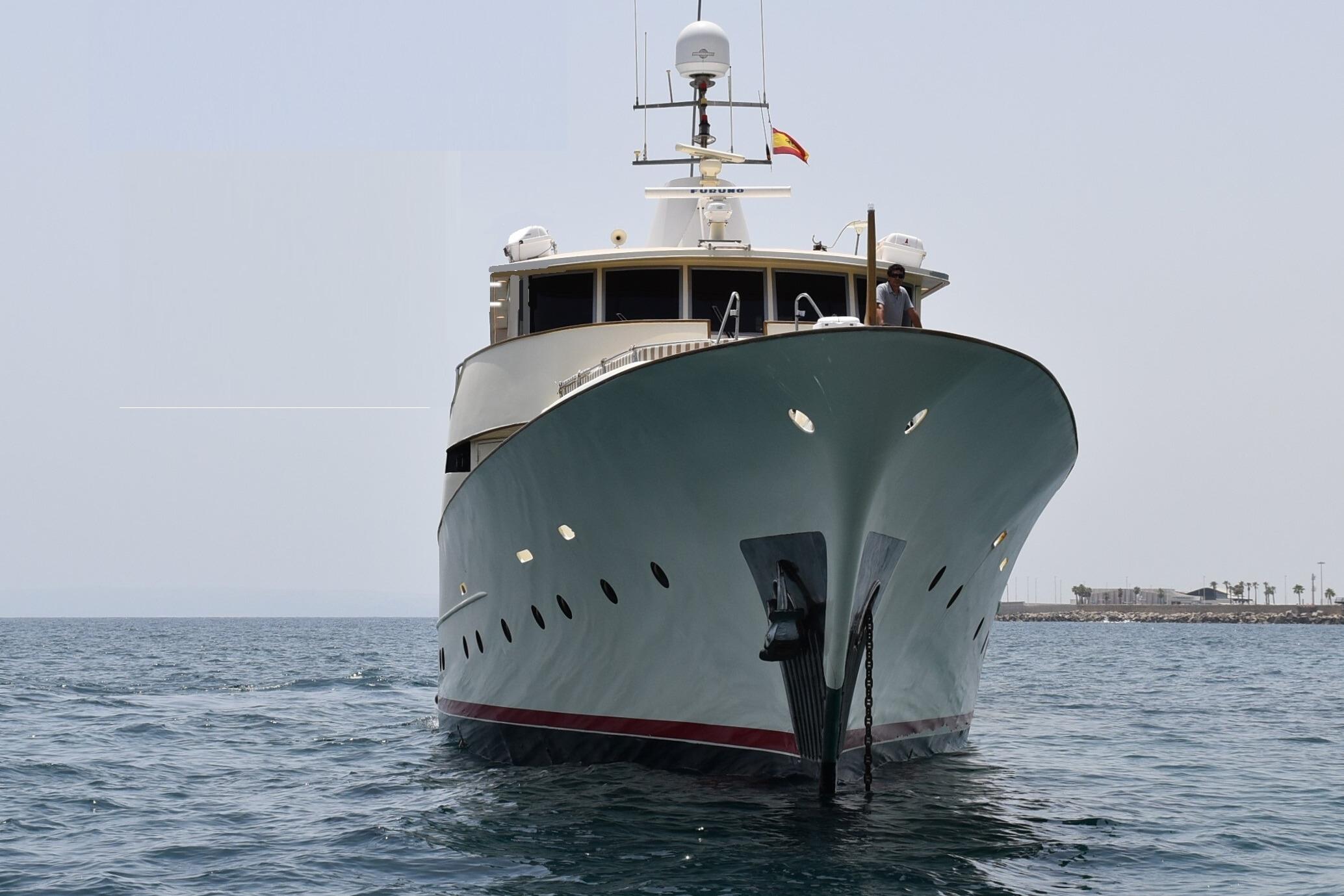 Explorer Trawler 34m yacht from 2005 on open water, front view.