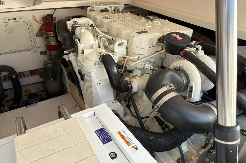  Yacht Photos Pics Engine compartment of a 2008 Tiara Yachts 3000 Open, showcasing detailed machinery.