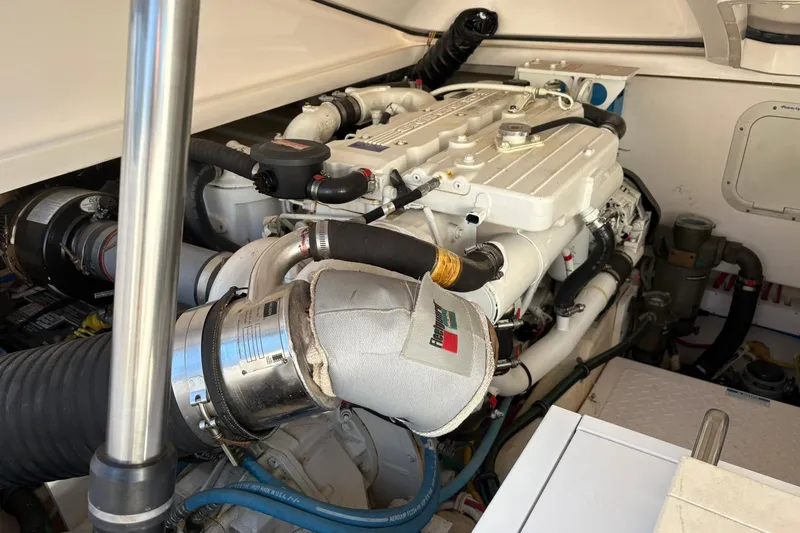  Yacht Photos Pics Engine compartment of a 2008 Tiara Yachts 3000 Open, showcasing detailed machinery.