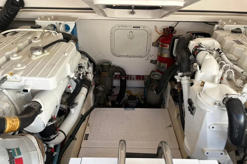  Yacht Photos Pics Engine room of a 2008 Tiara Yachts 3000 Open, featuring dual engines and equipment.