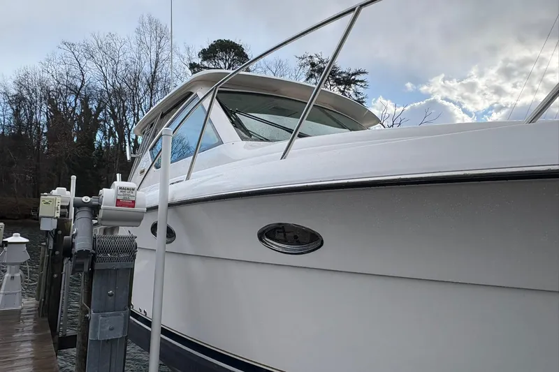  Yacht Photos Pics 2008 Tiara Yachts 3000 Open docked, showcasing sleek design and sturdy build.