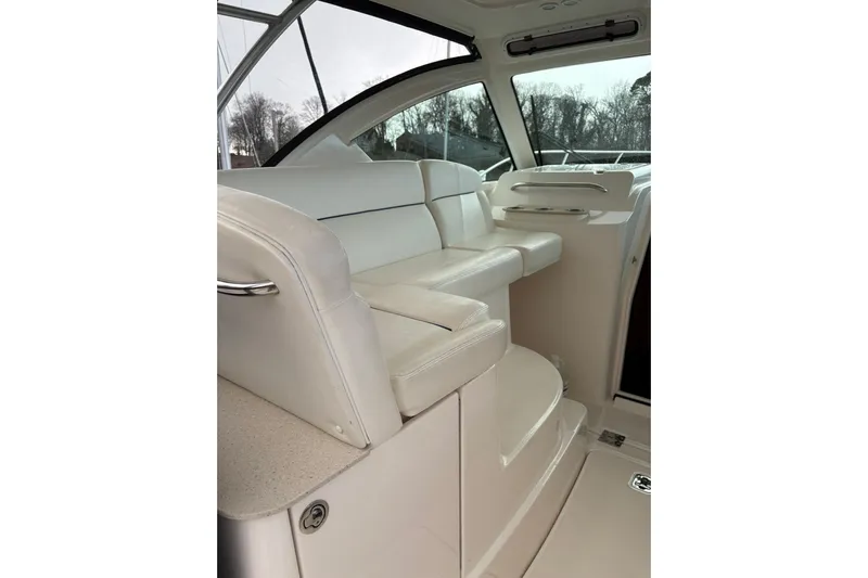  Yacht Photos Pics 2008 Tiara Yachts 3000 Open interior with white seating and sleek design.