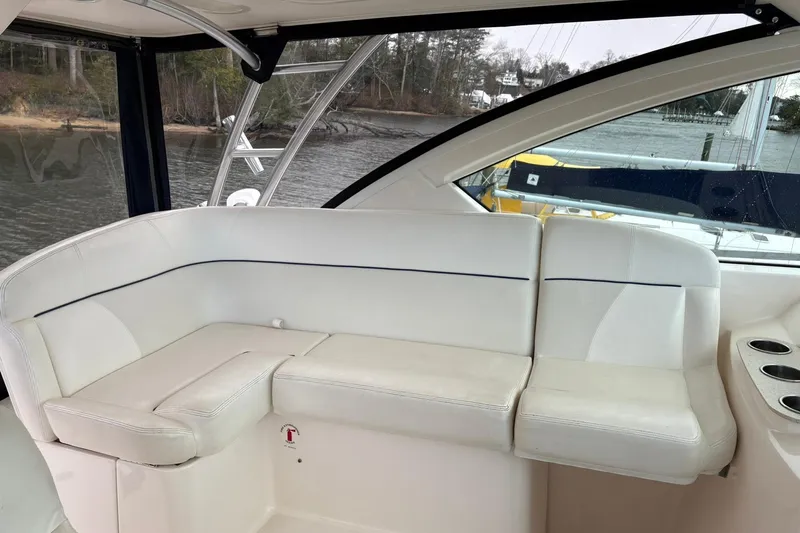  Yacht Photos Pics 2008 Tiara Yachts 3000 Open interior with white seating and cup holders.