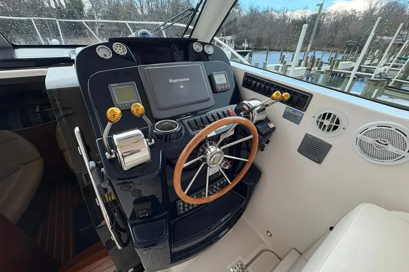  Yacht Photos Pics Helm of 2008 Tiara Yachts 3000 Open with Raymarine navigation system.