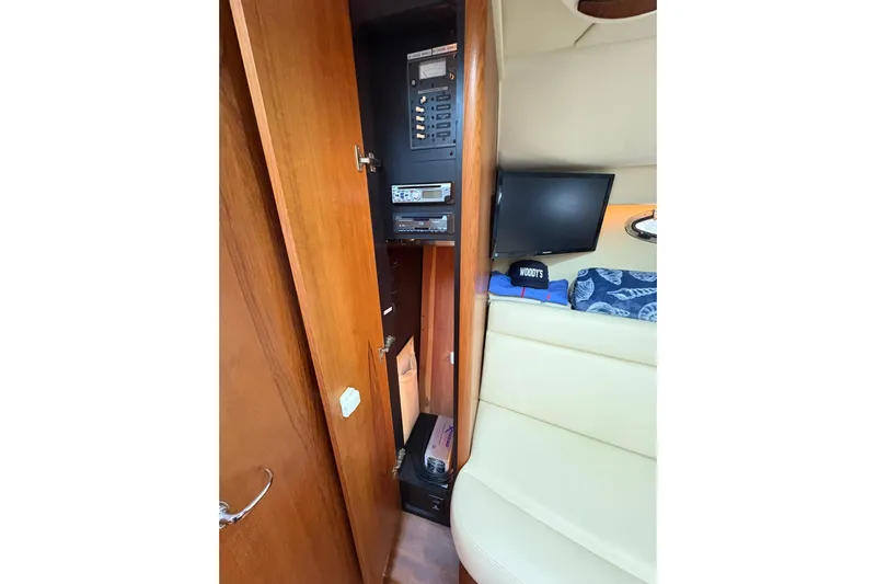  Yacht Photos Pics 2008 Tiara Yachts 3000 Open interior with control panel and seating area.