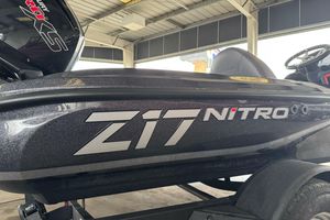 2026 Nitro Z17 boat under a covered area, showcasing sleek design and branding.