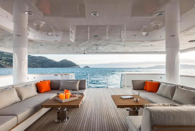 Explorer 130 Yacht Photos Pics Luxurious Ocean King Explorer 130 yacht deck with elegant seating, ocean view, and modern design, 2027 model.