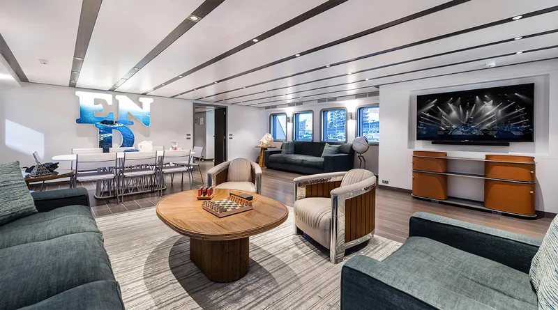 Explorer 130 Yacht Photos Pics Luxurious interior of 2027 Ocean King Explorer 130 yacht, featuring modern seating and entertainment area.