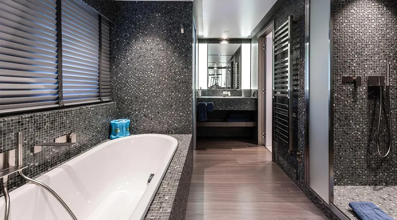 Explorer 130 Yacht Photos Pics Luxurious bathroom in Ocean King Explorer 130 yacht, 2027 model, featuring sleek modern design.