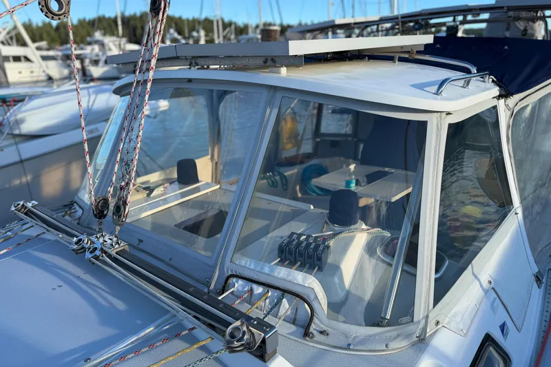 Shumka Yacht Photos Pics 2005 Catalina 42 MkII sailboat cockpit with rigging and marina background.