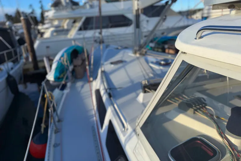 Shumka Yacht Photos Pics 2005 Catalina 42 MkII sailboat docked at marina, showcasing deck and cabin details.