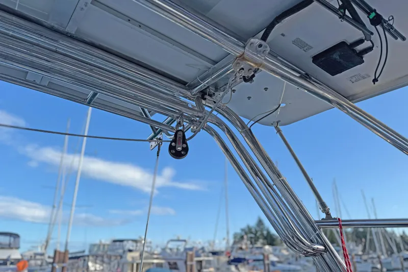 Shumka Yacht Photos Pics Stainless steel rigging on a 2005 Catalina 42 MkII sailboat, with marina background.