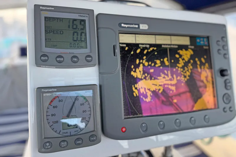 Shumka Yacht Photos Pics Raymarine navigation system on 2005 Catalina 42 MkII sailboat, displaying depth and radar data.
