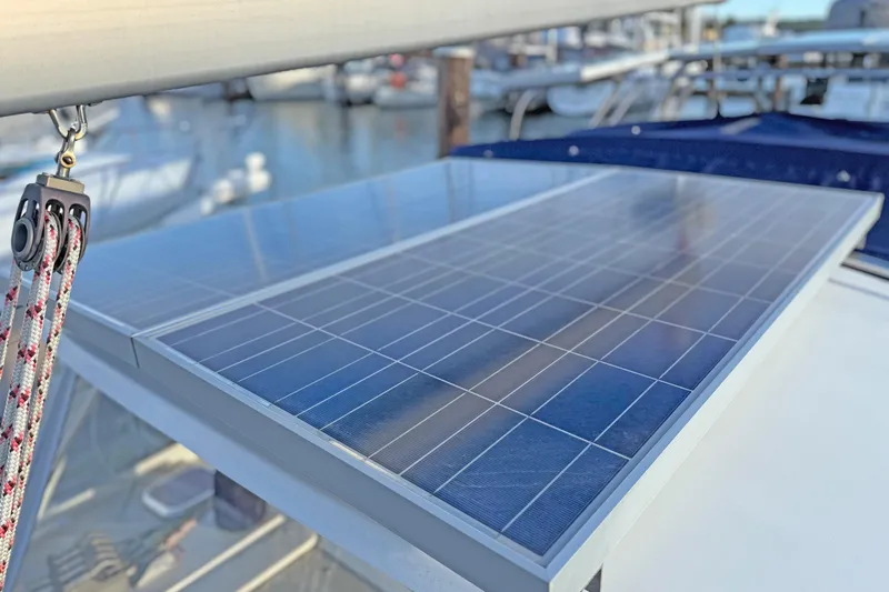 Shumka Yacht Photos Pics Solar panel on 2005 Catalina 42 MkII sailboat, docked at marina.