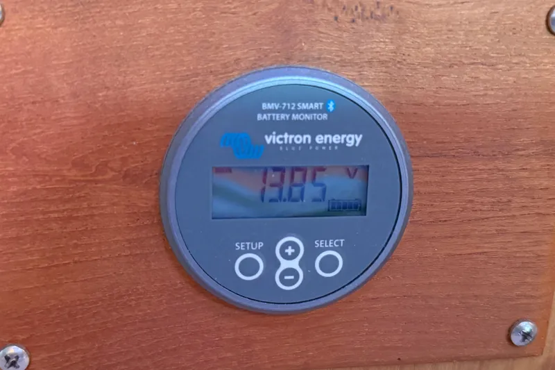 Shumka Yacht Photos Pics Victron Energy BMV-712 Smart battery monitor displaying 13.05V on Catalina 42 MkII, 2005.