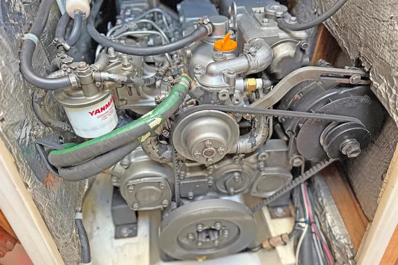 Shumka Yacht Photos Pics Engine compartment of a 2005 Catalina 42 MkII sailboat, featuring a Yanmar diesel engine.