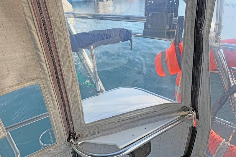 Shumka Yacht Photos Pics View from a 2005 Catalina 42 MkII sailboat cockpit with protective canvas and life jacket.