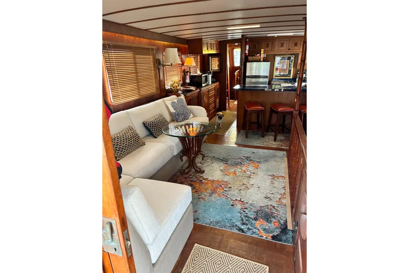 Savasa Yacht Photos Pics Interior of 1979 Cheoy Lee 46 LRC yacht with cozy seating and elegant decor.