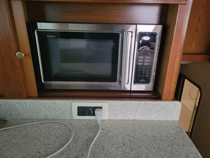  Yacht Photos Pics Built-in microwave in the kitchen of a 1986 Ocean Yachts 55 Super Sport.