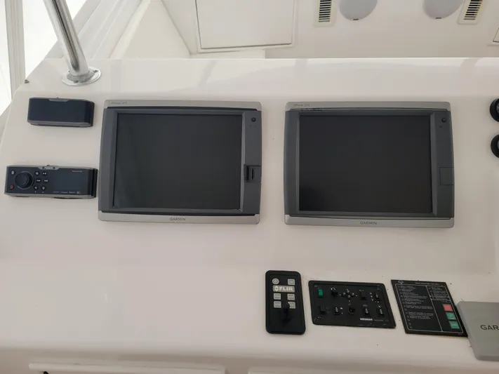  Yacht Photos Pics Control panel of a 1986 Ocean Yachts 55 Super Sport with dual Garmin displays.
