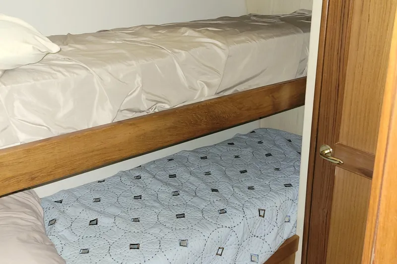  Yacht Photos Pics Bunk beds in the 1986 Ocean Yachts 55 Super Sport cabin.