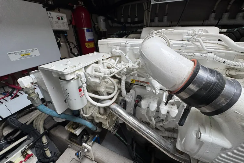 Floor It Yacht Photos Pics Engine room of 2014 Sea Ray 510 Sundancer, showcasing detailed mechanical components.