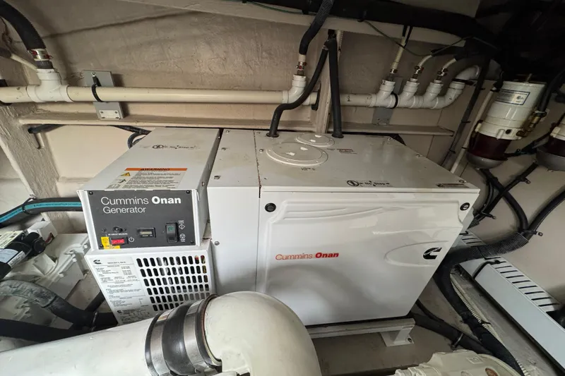 Floor It Yacht Photos Pics Cummins Onan generator in 2014 Sea Ray 510 Sundancer engine room.