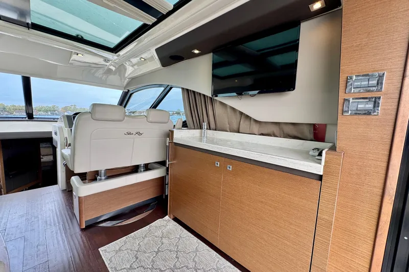 Floor It Yacht Photos Pics Luxurious interior of 2014 Sea Ray 510 Sundancer yacht with modern amenities.