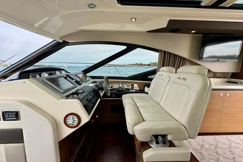 Floor It Yacht Photos Pics Luxurious 2014 Sea Ray 510 Sundancer yacht interior with helm and seating.