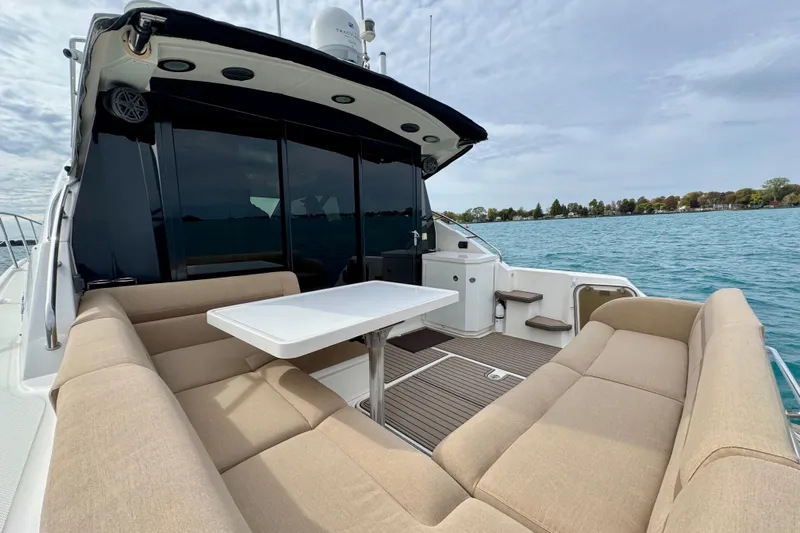 Floor It Yacht Photos Pics Luxurious 2014 Sea Ray 510 Sundancer yacht with spacious outdoor seating and table.