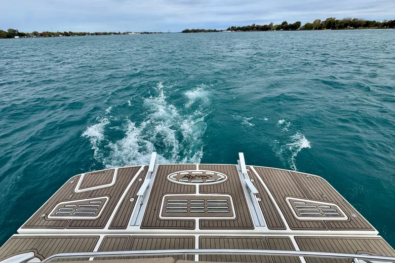 Floor It Yacht Photos Pics 2014 Sea Ray 510 Sundancer cruising on open water, view from the deck.