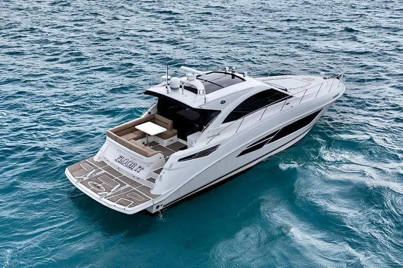 Floor It Yacht Photos Pics 2014 Sea Ray 510 Sundancer yacht cruising on open water.