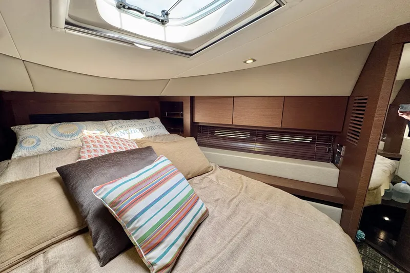Floor It Yacht Photos Pics Luxurious cabin interior of 2014 Sea Ray 510 Sundancer yacht with cozy bedding.
