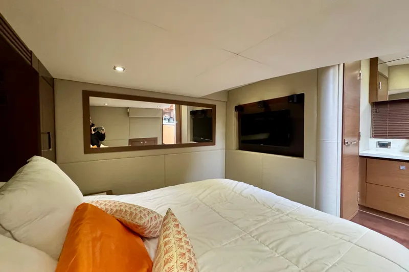 Floor It Yacht Photos Pics Luxurious bedroom interior of 2014 Sea Ray 510 Sundancer yacht with modern amenities.