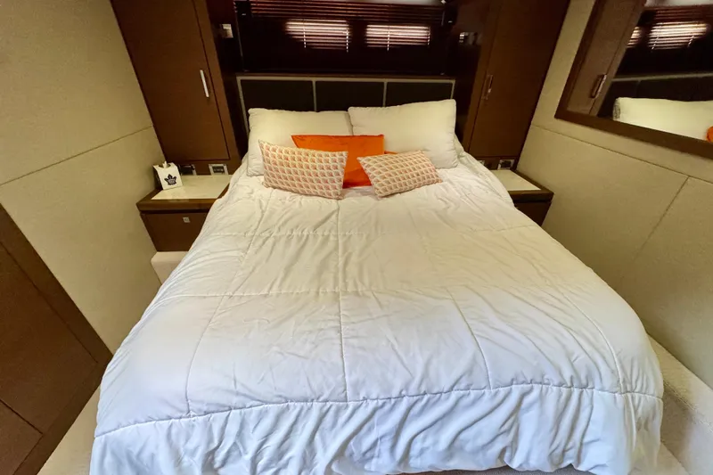 Floor It Yacht Photos Pics Luxurious bedroom interior of 2014 Sea Ray 510 Sundancer yacht with cozy bedding.