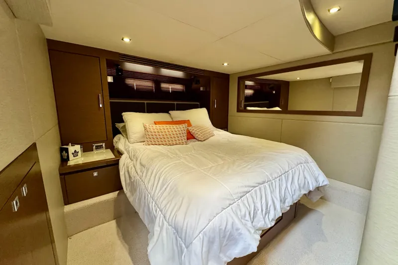 Floor It Yacht Photos Pics Luxurious bedroom interior of 2014 Sea Ray 510 Sundancer yacht with cozy bedding.