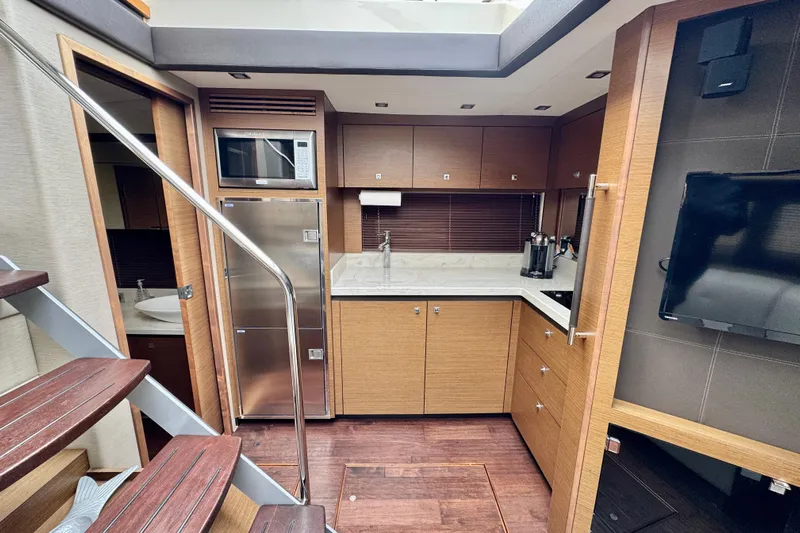 Floor It Yacht Photos Pics Luxurious 2014 Sea Ray 510 Sundancer yacht interior with modern kitchen and sleek design.