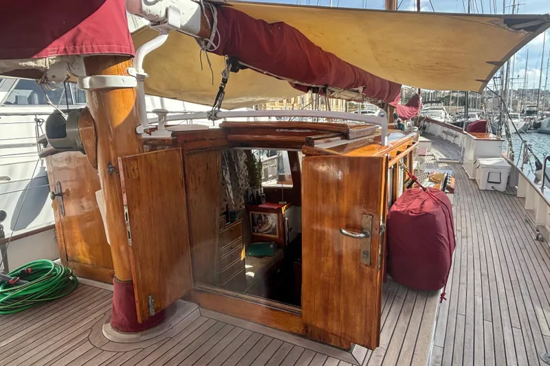 Barinia Yacht Photos Pics Vintage 1950 MOLLICH Sailing yacht with open wooden cabin doors and deck view.