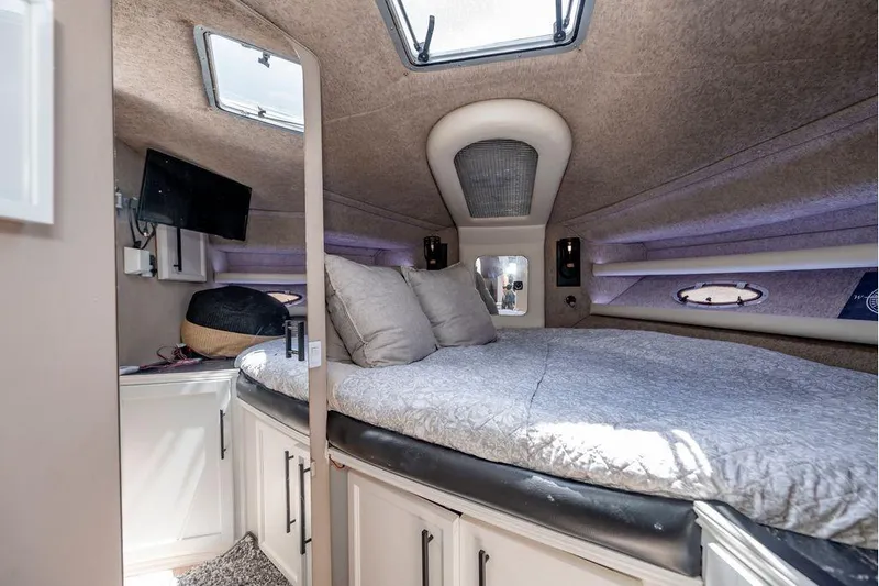 Bada Bing Yacht Photos Pics 1991 Cruisers Yachts 3850 Aft Cabin interior with cozy bed and modern amenities.