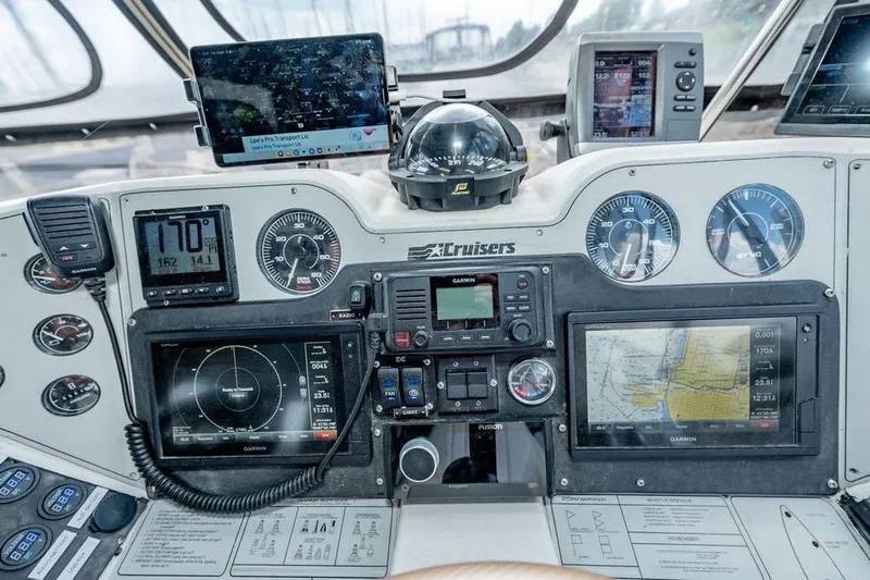 Bada Bing Yacht Photos Pics Cockpit of 1991 Cruisers Yachts 3850 Aft Cabin with navigation instruments and controls.